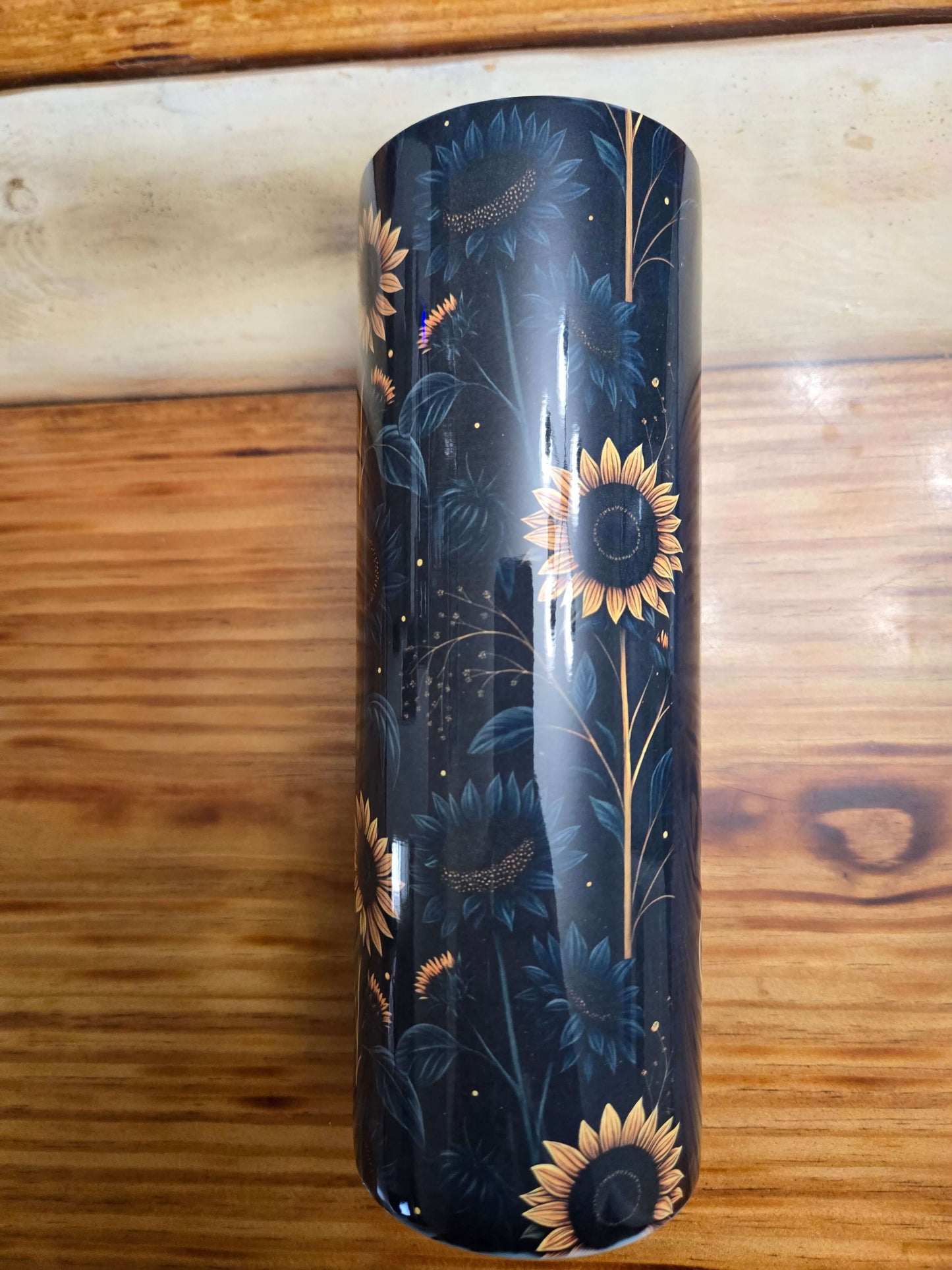Stylish 20oz tumbler cup featuring sunflower and floral design, perfect for hot or cold beverages.