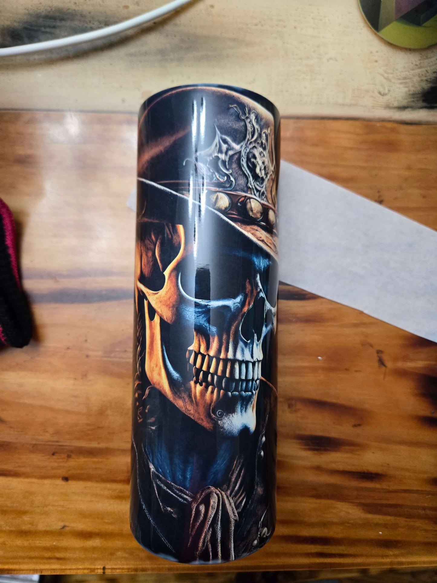 Skull Cowboy 20oz tumbler cup featuring an intricate skull design, perfect for hot or cold beverages on the go.