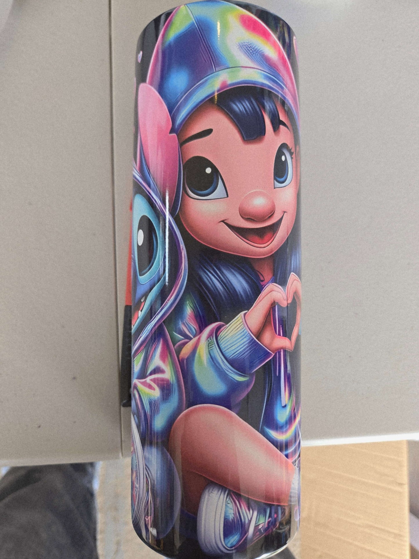 Vibrant Stitch character design on 20oz tumbler cup, perfect for Disney fans and unique home decor.