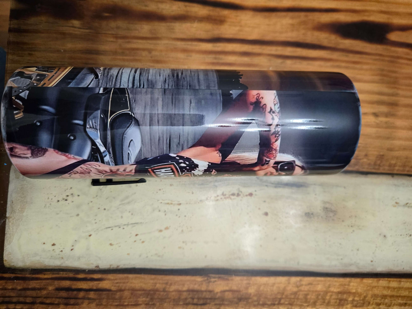 Harley Davidson biker tumbler cup showing vibrant designs, perfect for hot and cold drinks on the go.