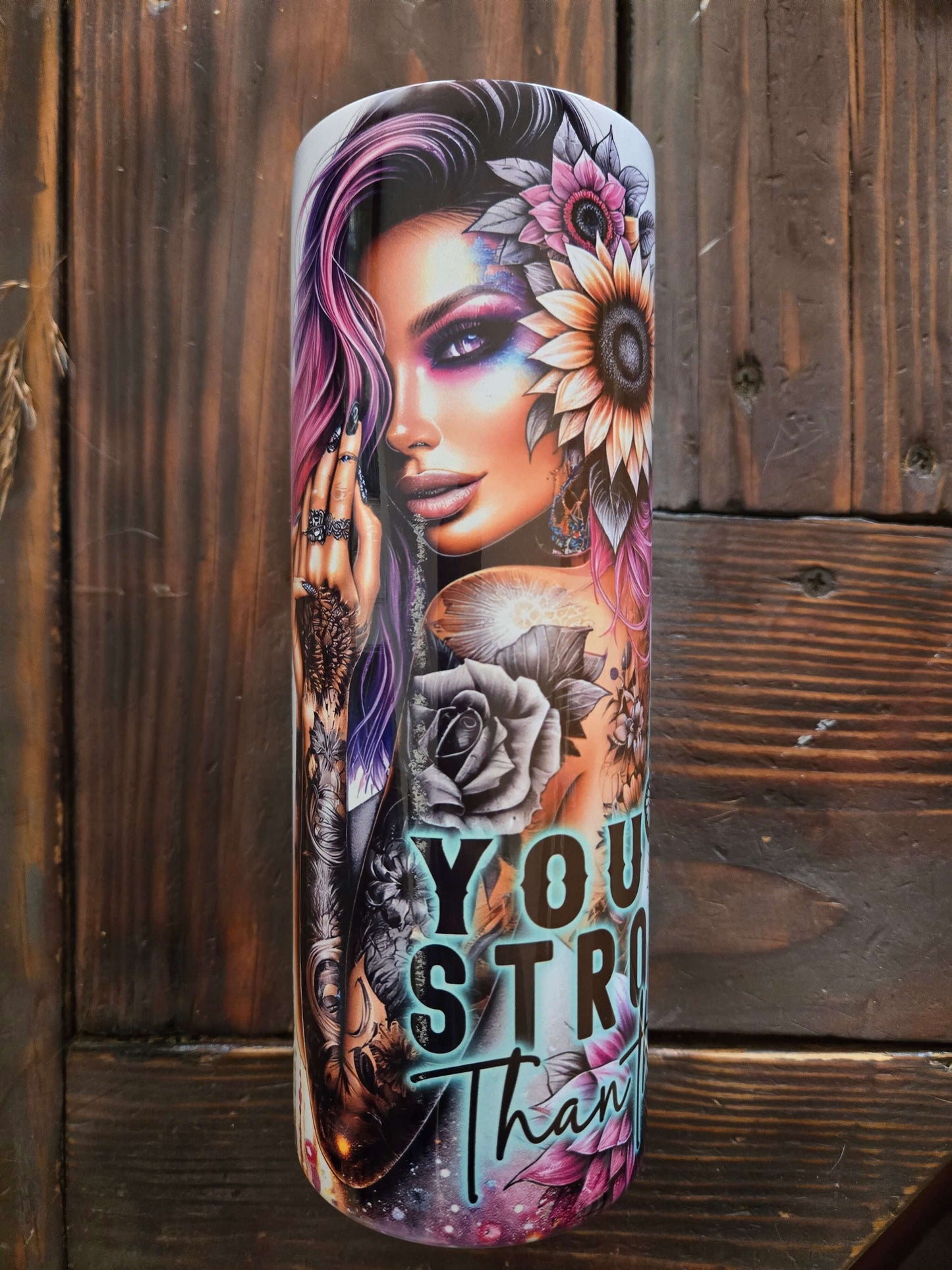 You Are Stronger Boss Mom tumbler with vibrant artwork and floral designs, perfect for hot or cold drinks on the go.