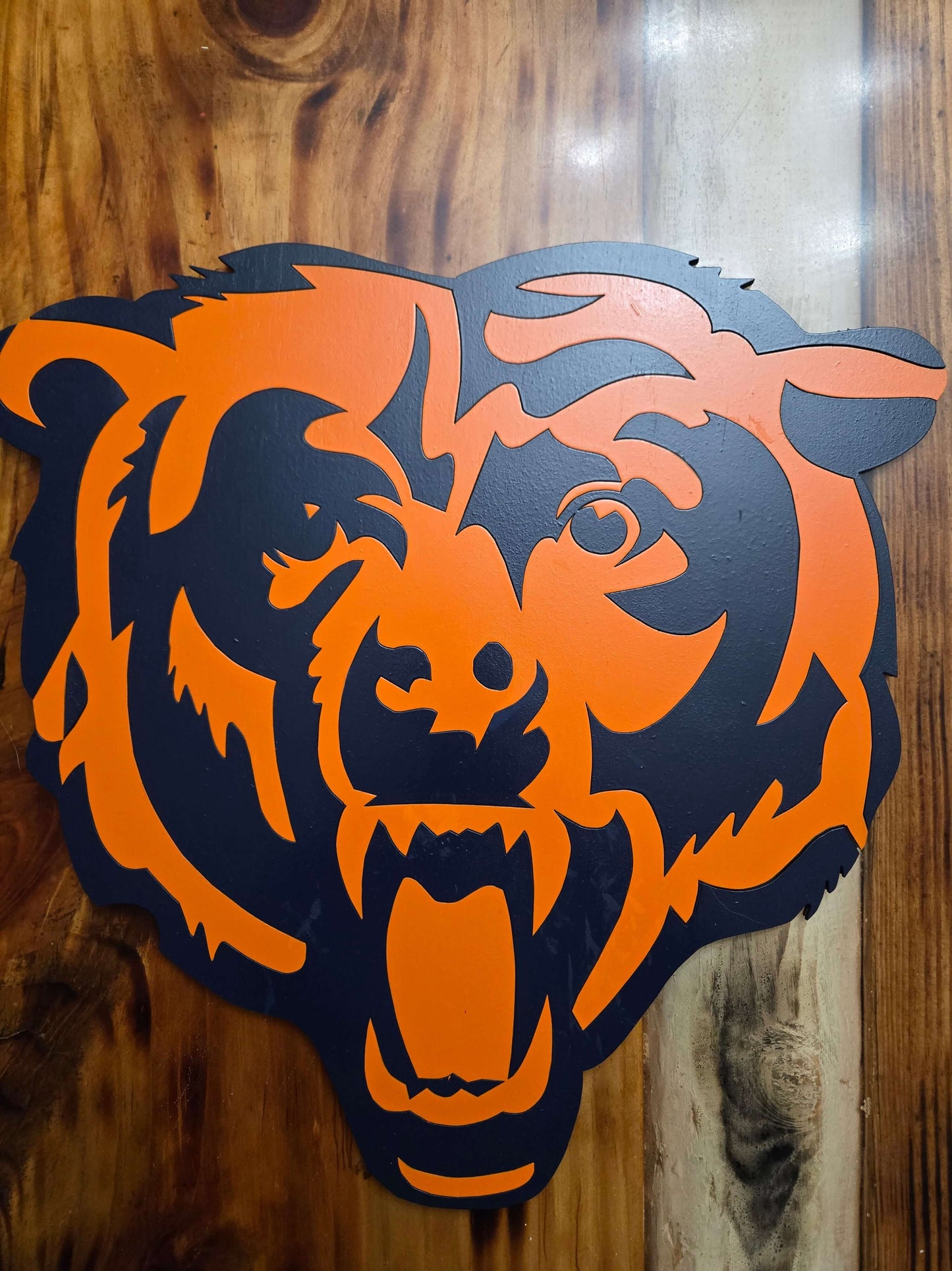 Bears wooden football sign featuring the team logo, perfect home decor for sports fans.
