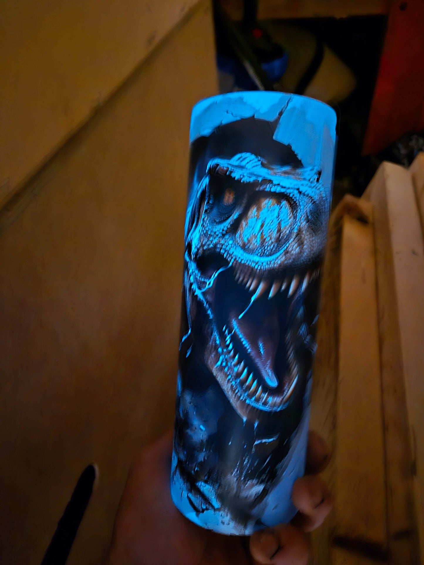 T-Rex glow in the dark tumbler cup featuring a dramatic dinosaur design, perfect for drinkware enthusiasts.