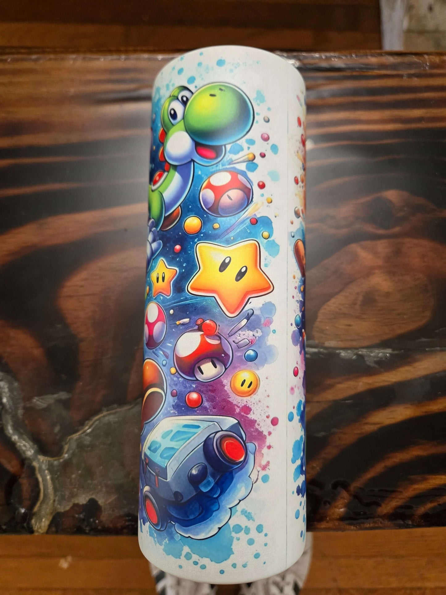 Vibrant Mario Brothers 20oz tumbler cup featuring Yoshi and iconic cartoon elements, perfect for kids and adults.