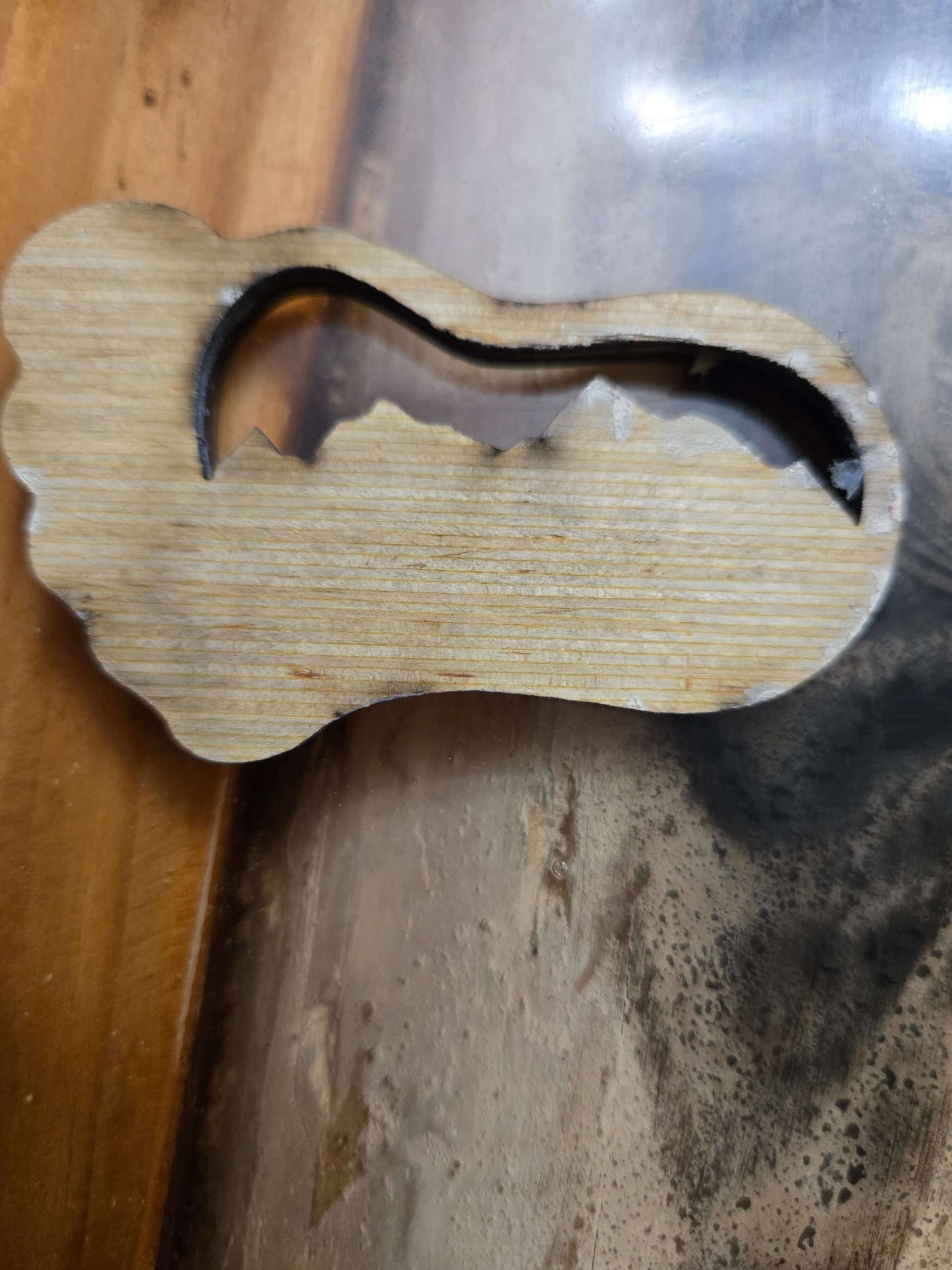 Handmade Bigfoot keychain crafted from high-quality wood, perfect for travel and organization on the go.