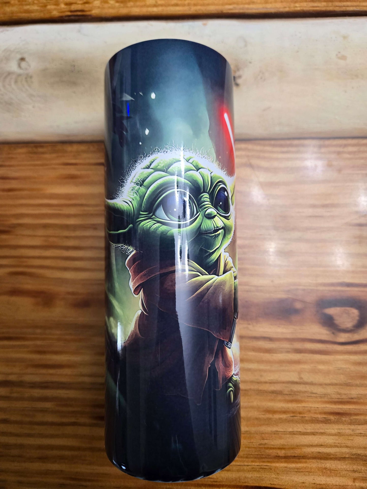Star Wars Yoda tumbler cup featuring vibrant design, perfect for hot or cold drinks on the go.