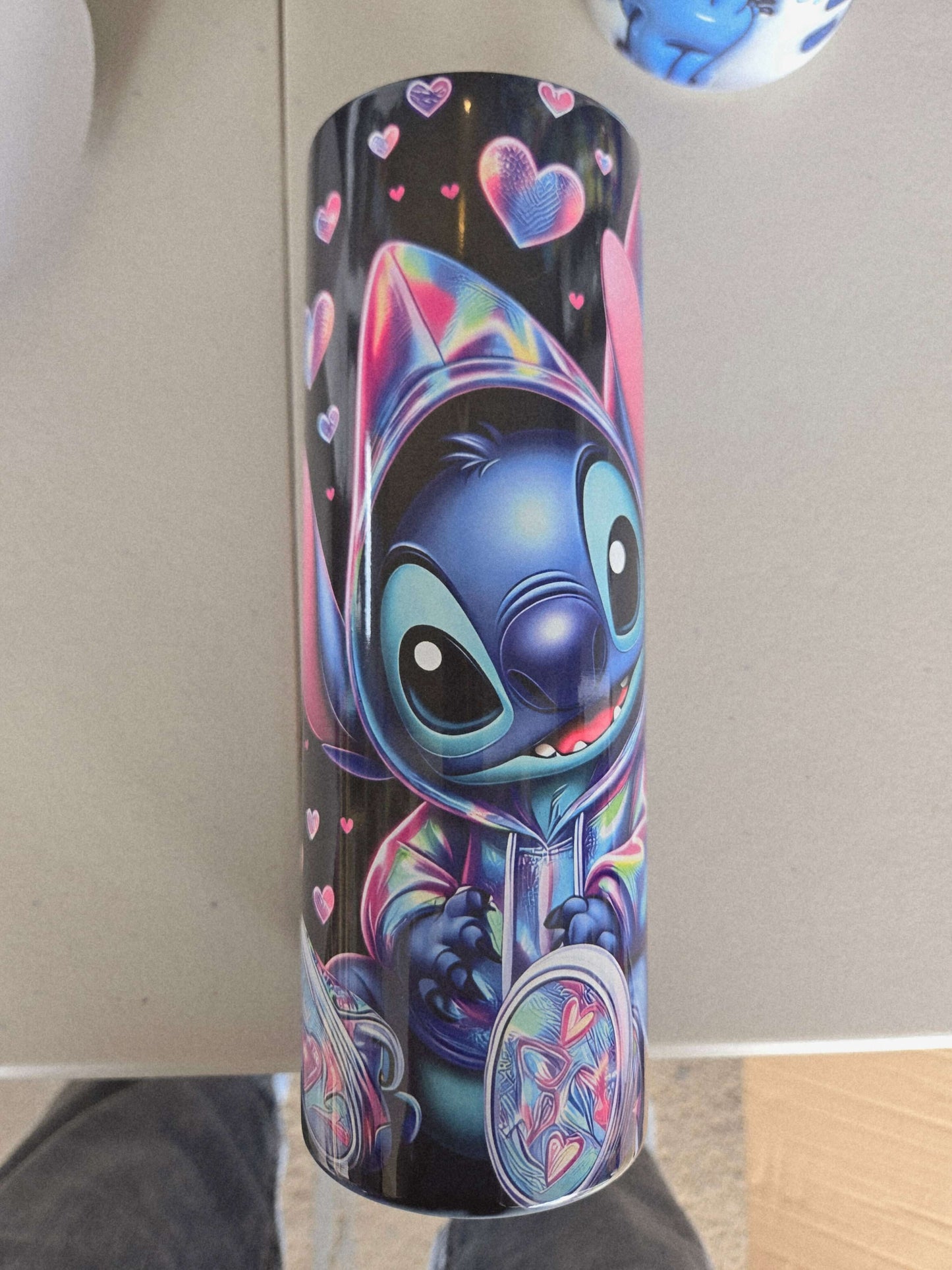 Vibrant Stitch character design on a 20oz tumbler cup, perfect for Disney fans and stylish travel drinkware.