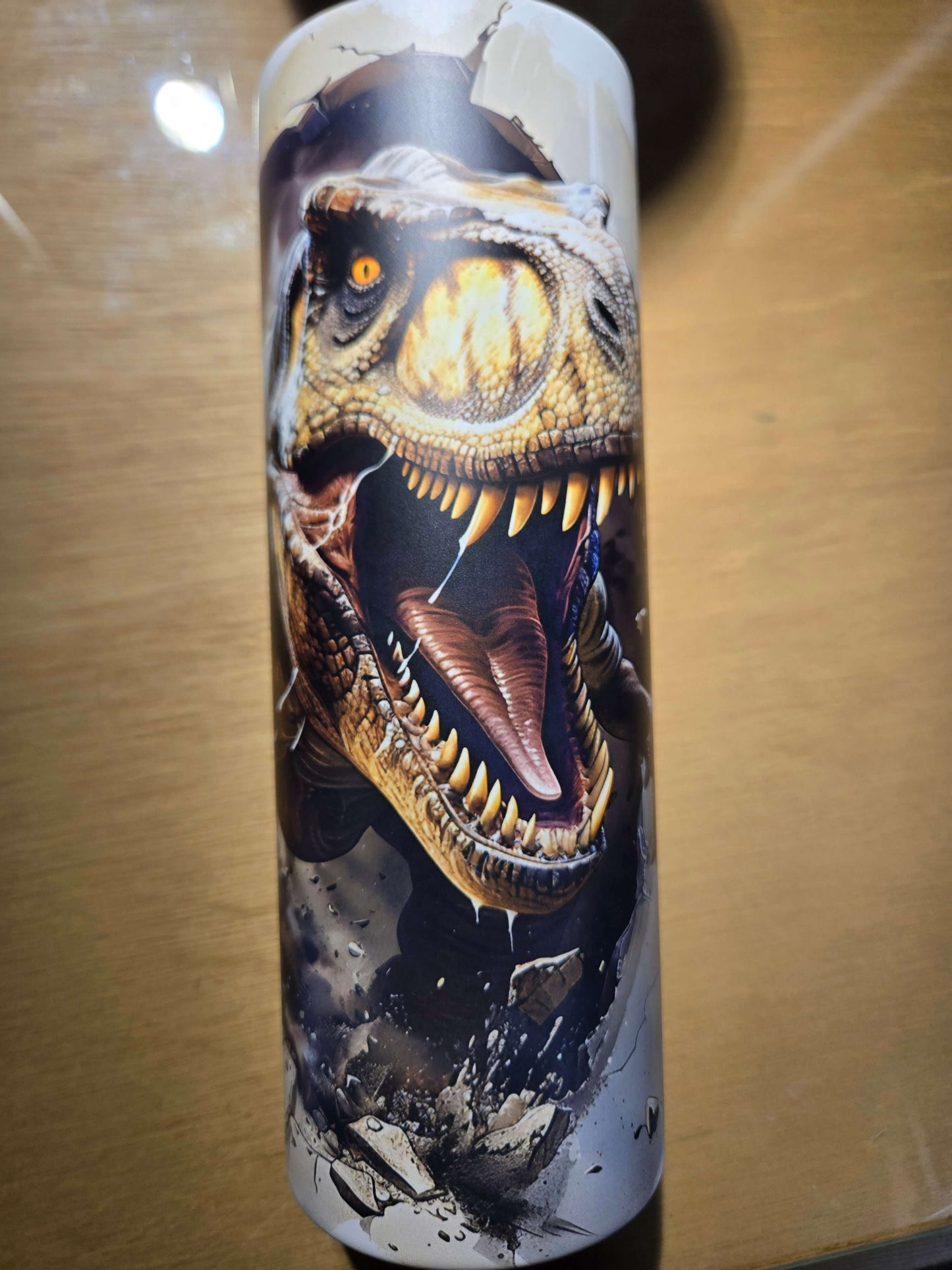 T-Rex glow in the dark tumbler cup featuring a fierce dinosaur design for fun, hydration, and style.
