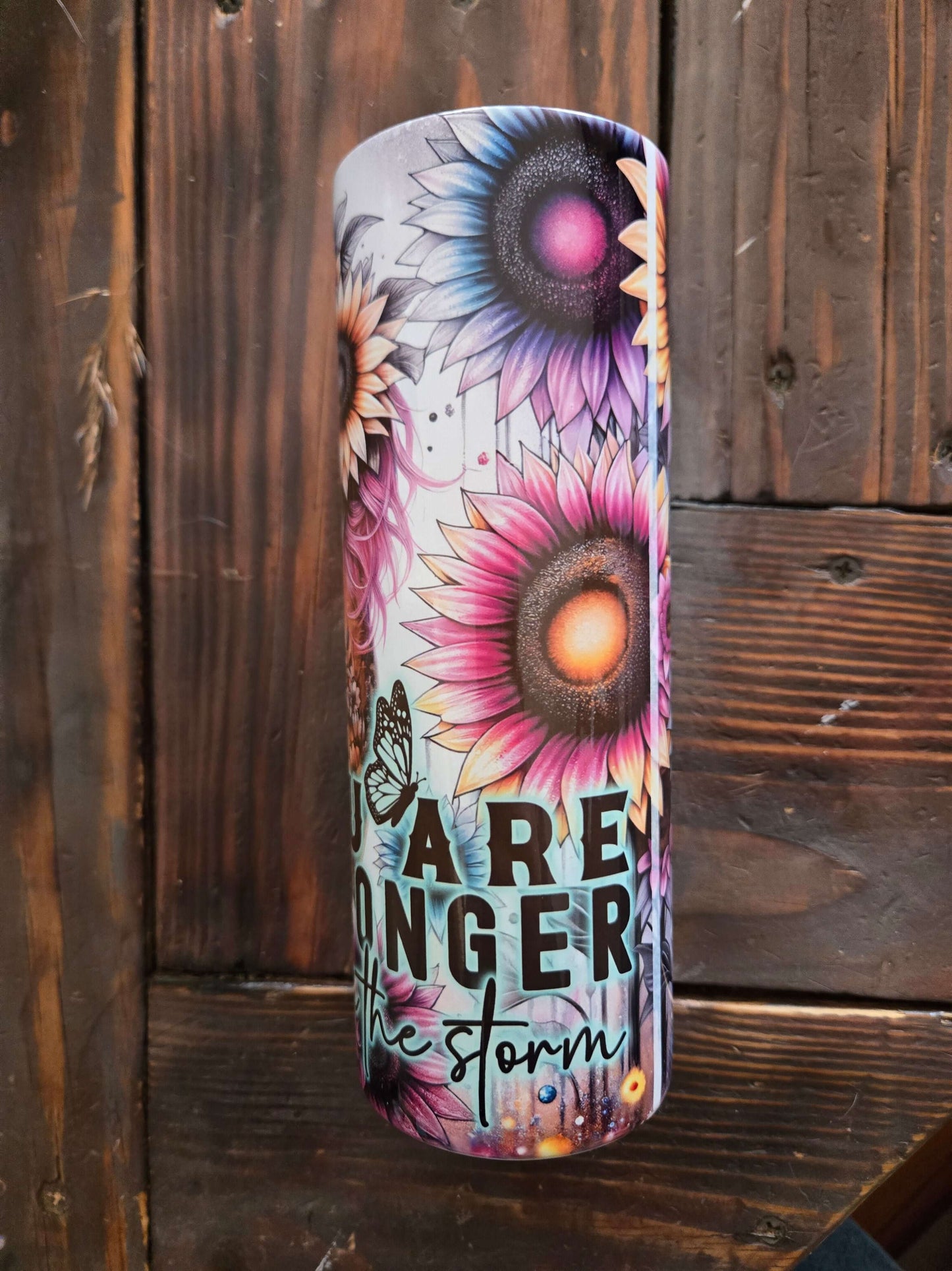 You Are Stronger Boss Mom 20oz tumbler cup with sunflowers and butterfly design.