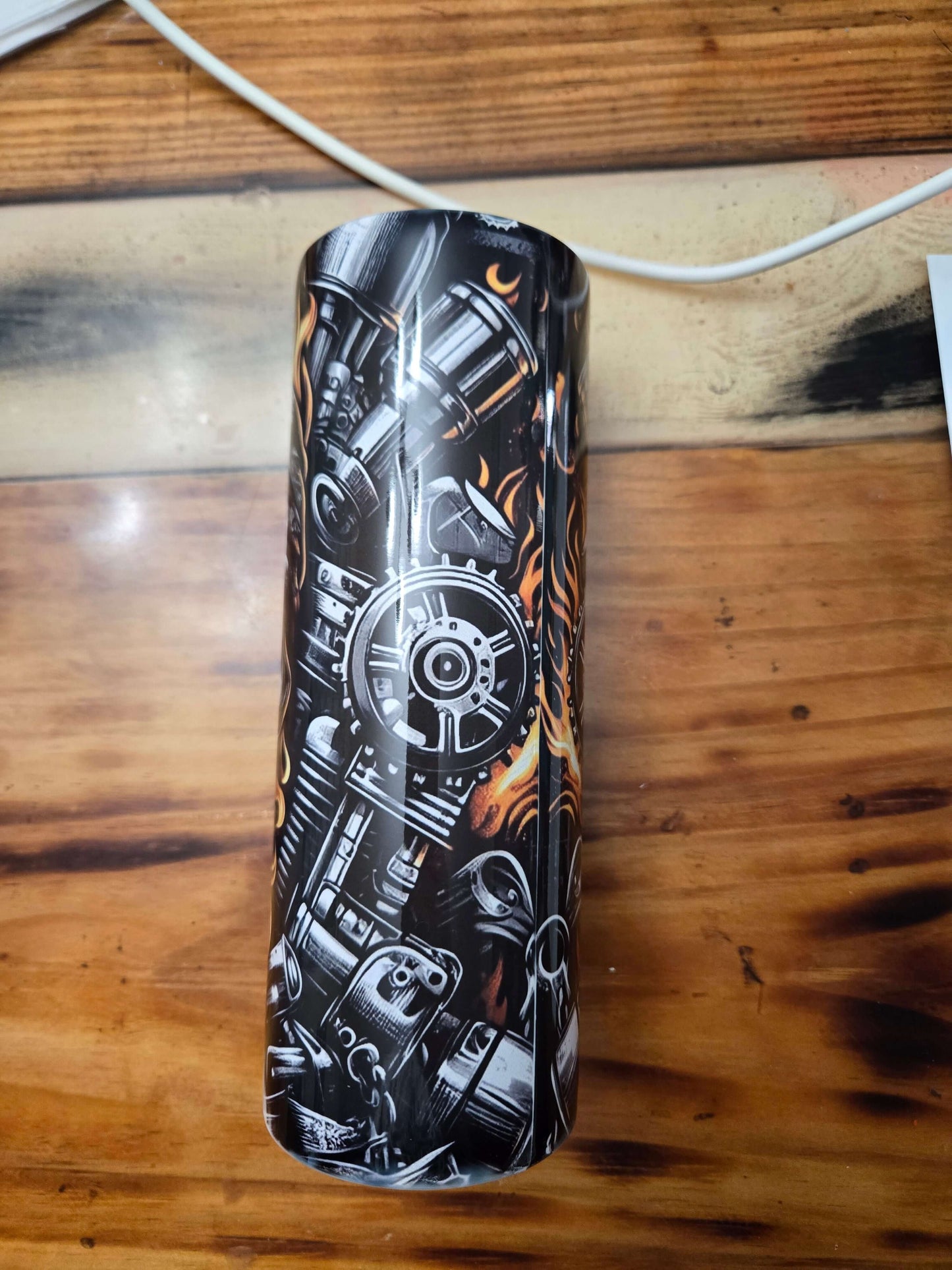 Skull Biker Flames 20oz Tumbler Cup featuring motorcycle engine design, perfect for travel and keeping drinks hot or cold.