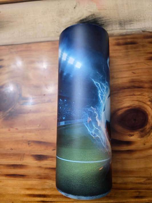Soccer tumbler cup featuring a dynamic sports scene with lightning effects, perfect for soccer fans.
