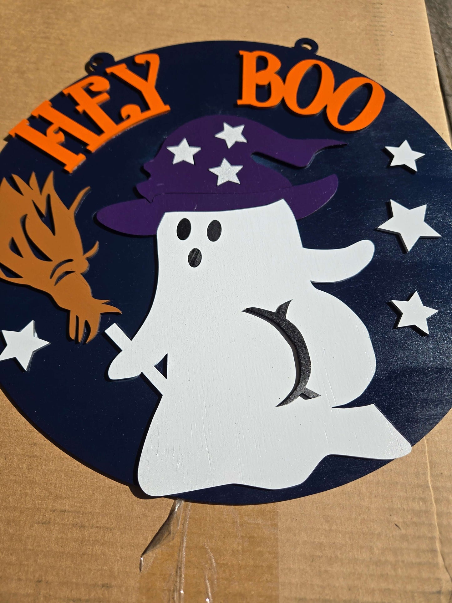 Hey Boo ghost wooden decor sign with humorous design and witch hat.