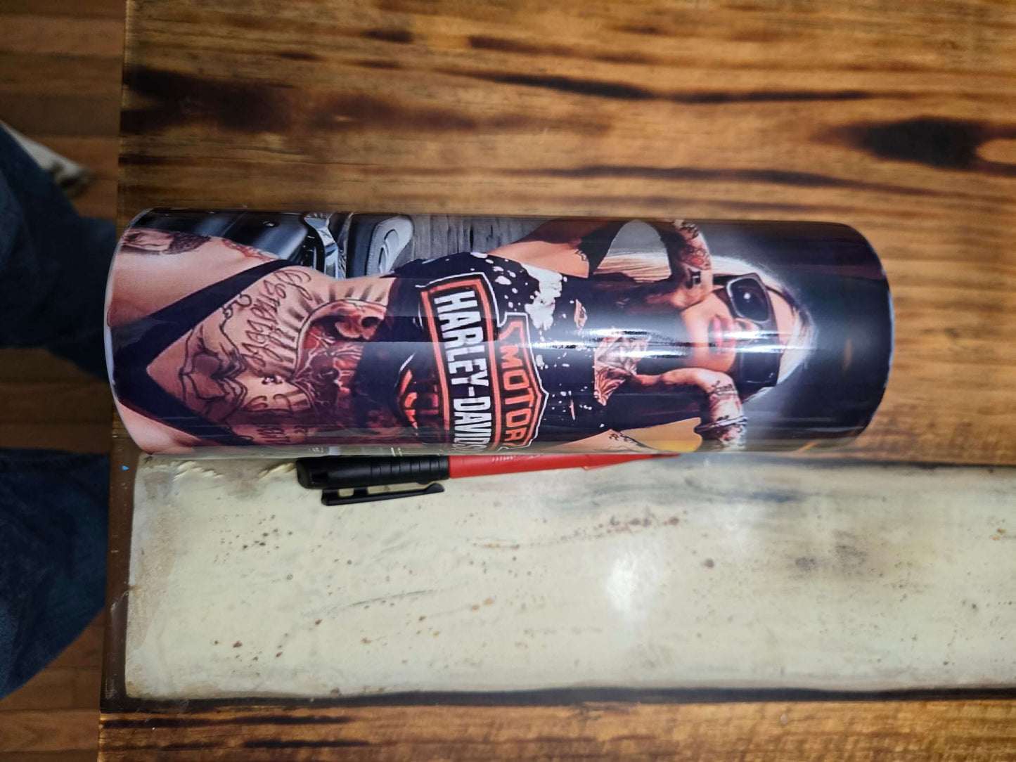 Harley Davidson biker chick tumbler cup with striking graphics, perfect for hot or cold drinks on the go.