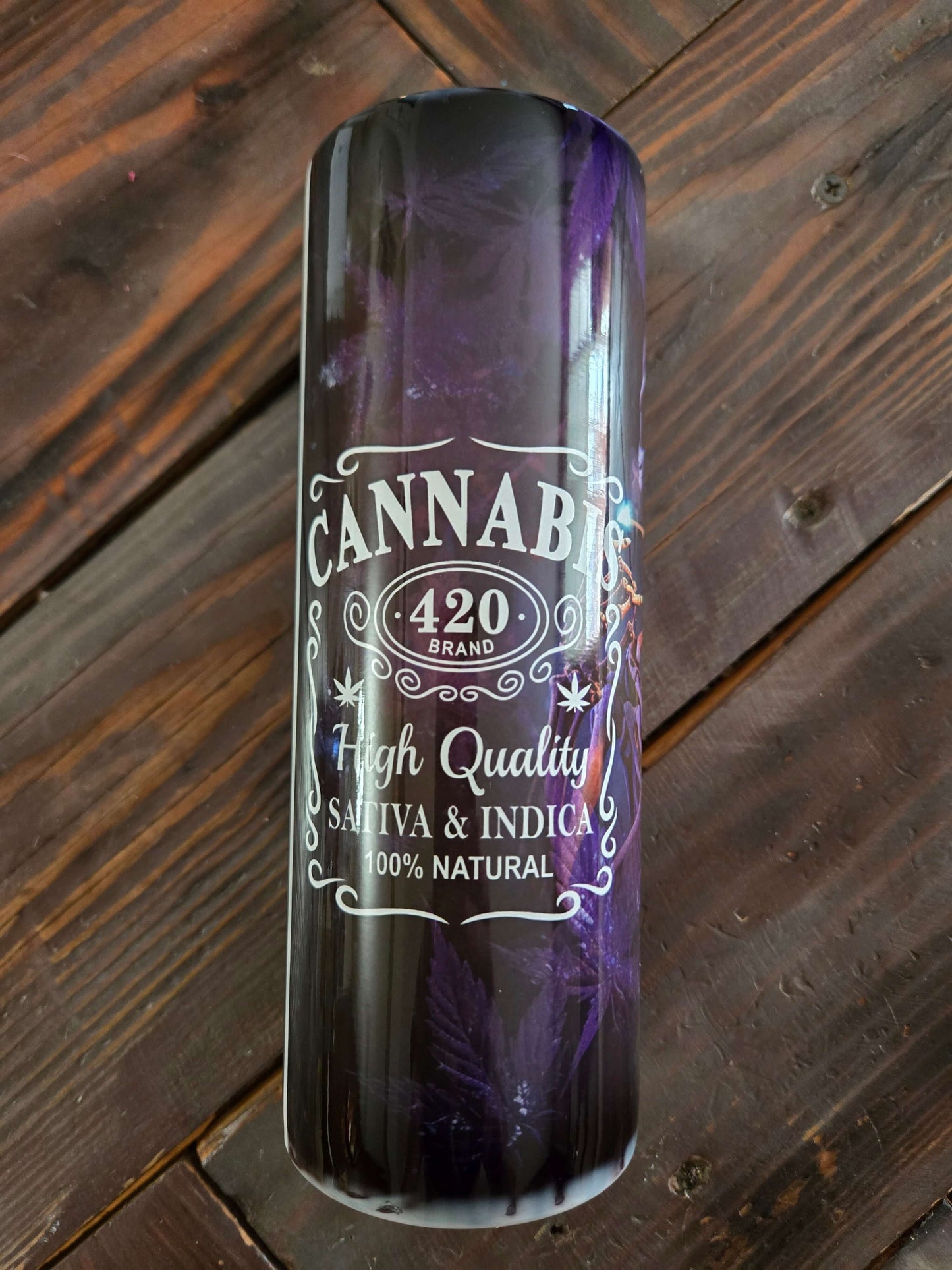 High-quality cannabis tumbler cup featuring stylish artwork, perfect for enthusiasts who appreciate Sativa and Indica.