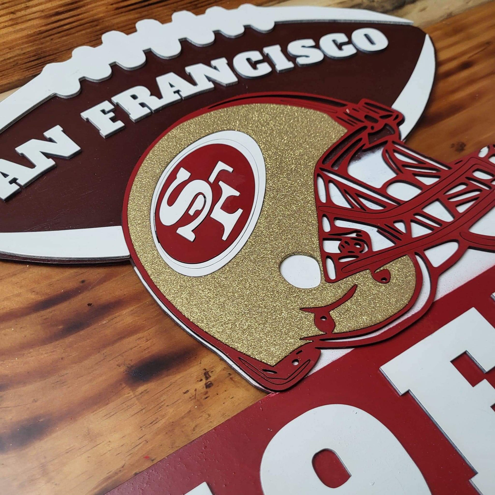 49ers football signs featuring a San Francisco 49ers helmet and team logo, perfect for NFL fans and home decor.