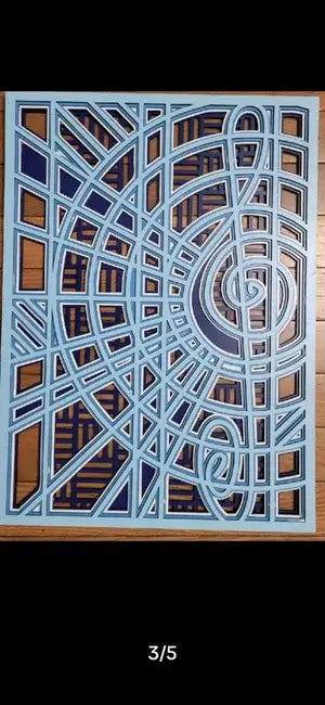 Decorative wood  screen with geometric pattern on a wooden surface