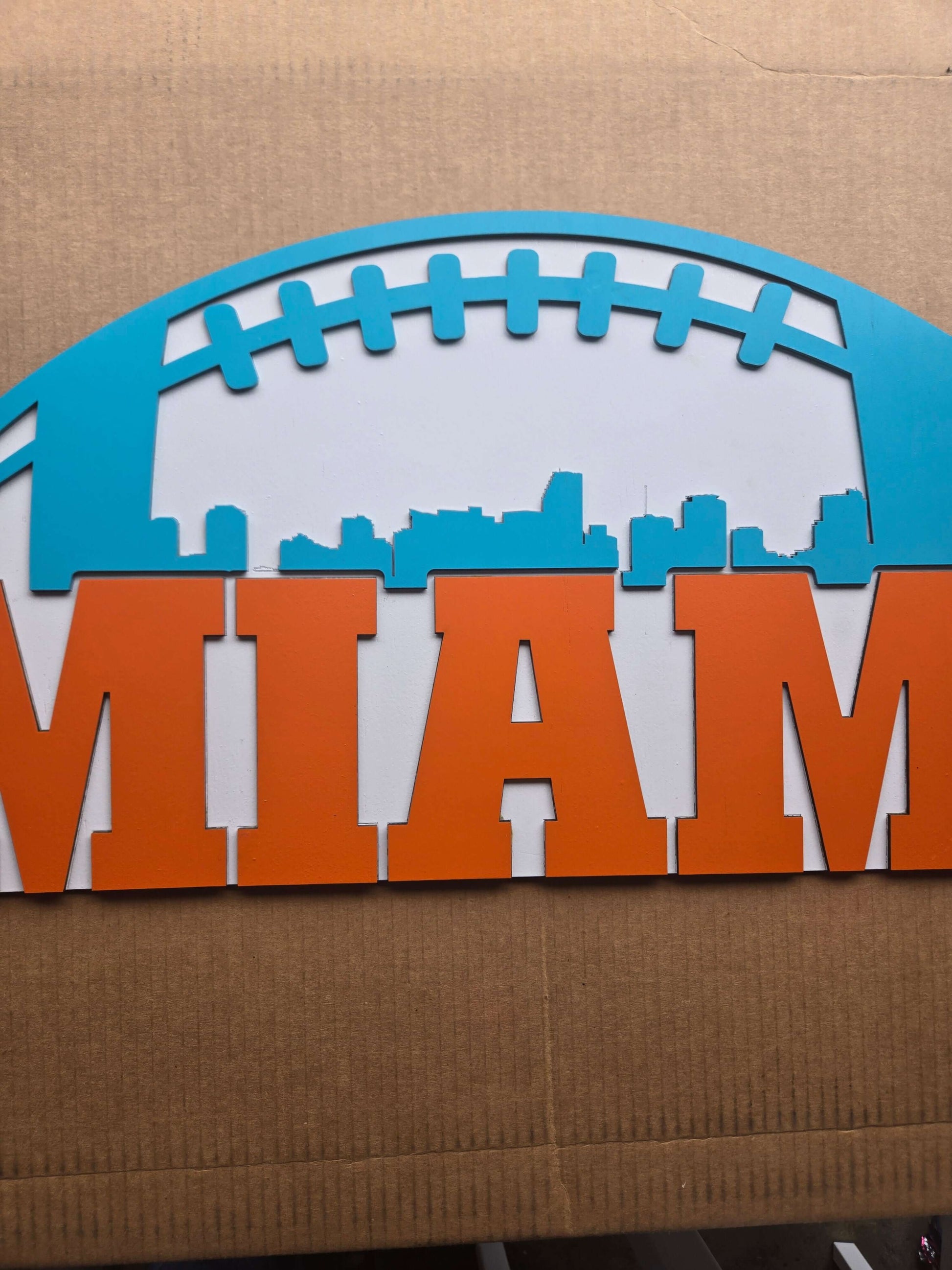 Miami football wooden decor sign featuring vibrant colors and skyline design.