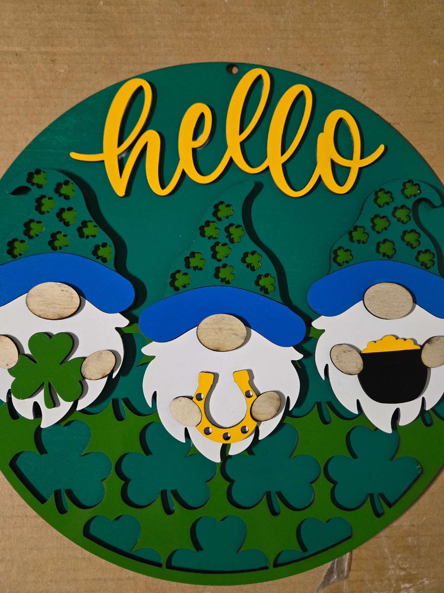 Hello Gnome St. Patrick's Day wooden decor sign featuring gnomes, shamrocks, and festive colors.