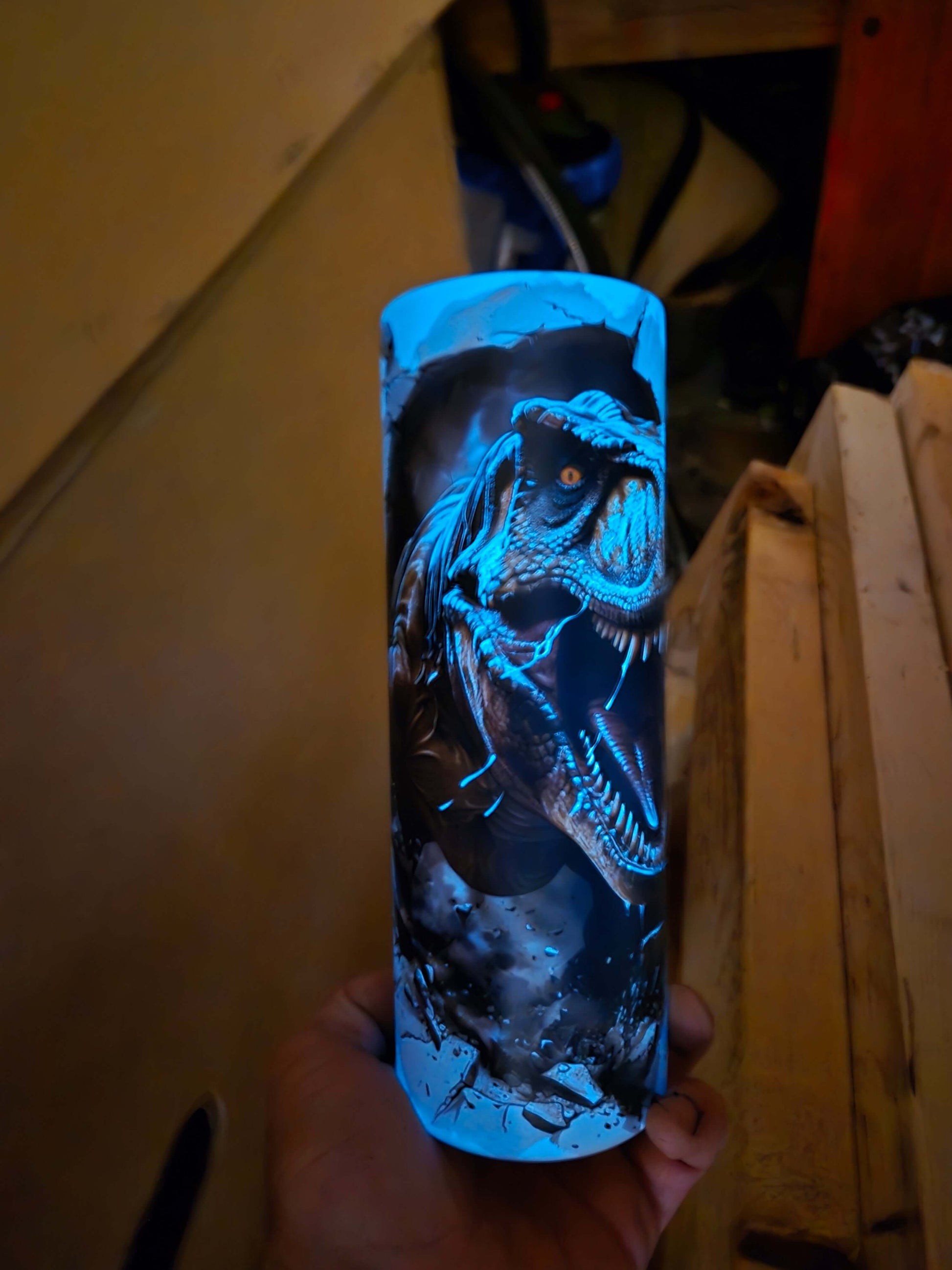 T-Rex glow in the dark tumbler cup showcasing a fierce dinosaur design, perfect for drinkware collection.