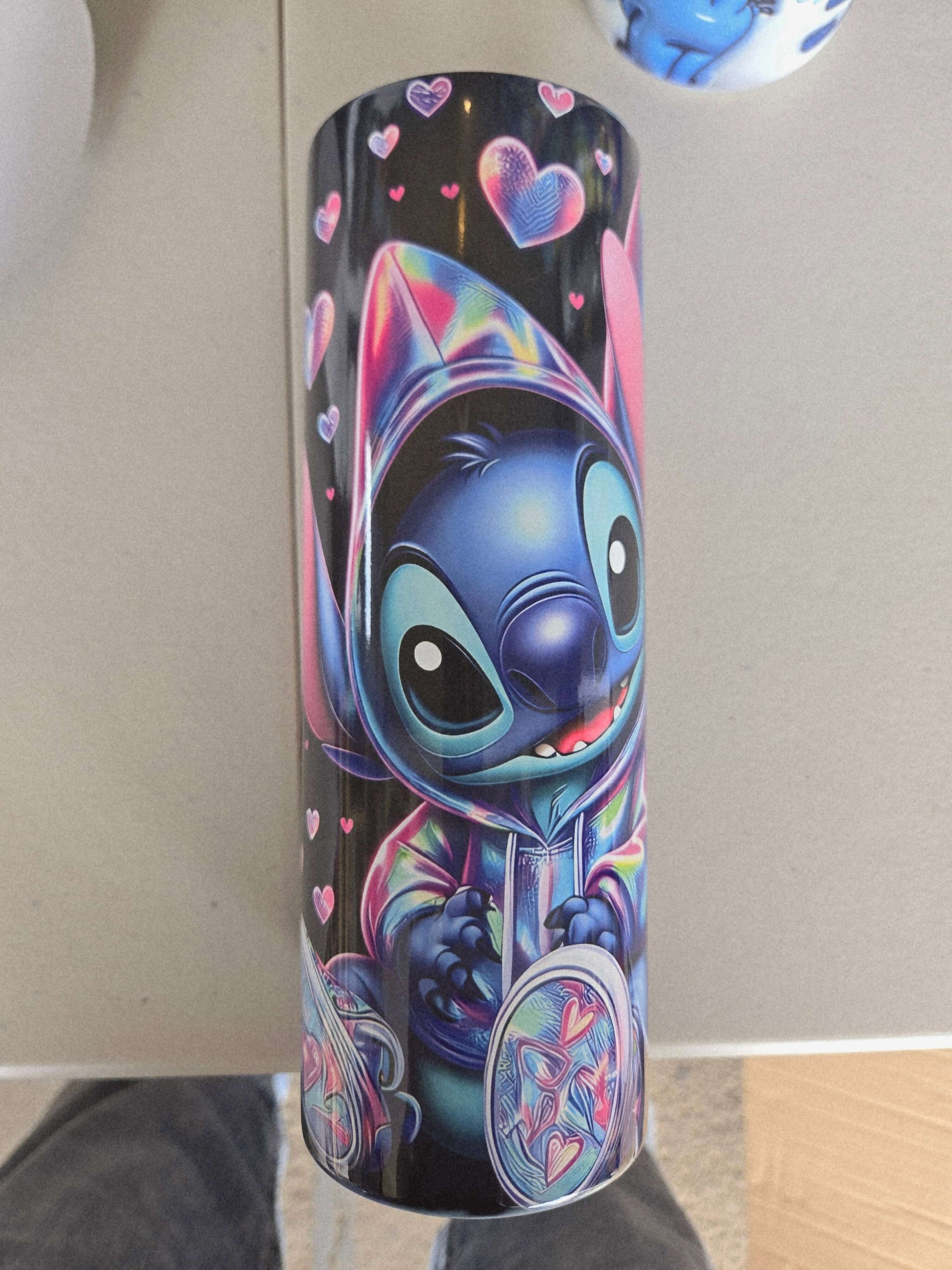 Vibrant Stitch character design on a 20oz tumbler cup, perfect for Disney fans and stylish travel drinkware.