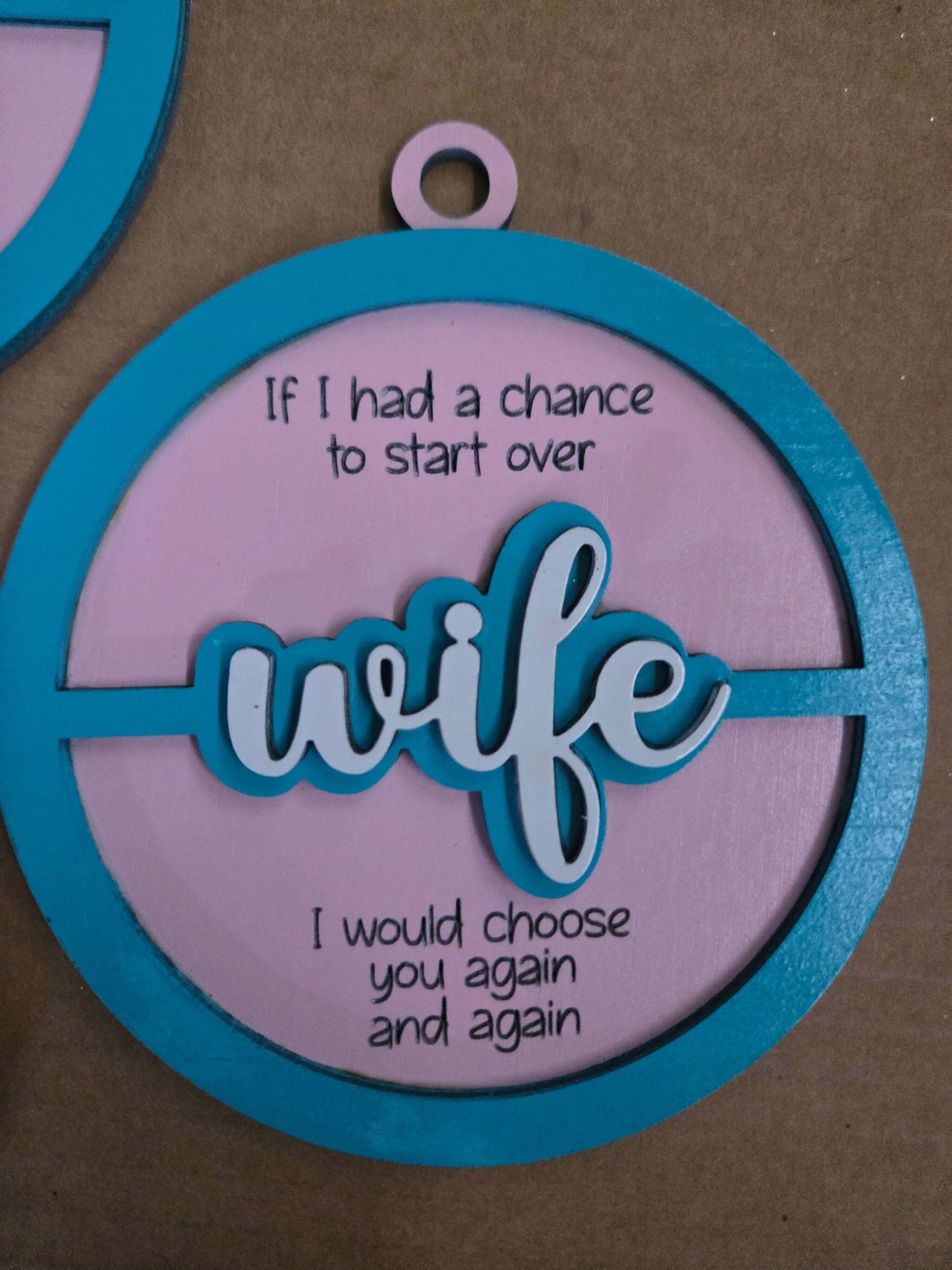 Wooden Christmas ornament featuring heartfelt quote about a wife, perfect for holiday decoration or as a thoughtful gift.
