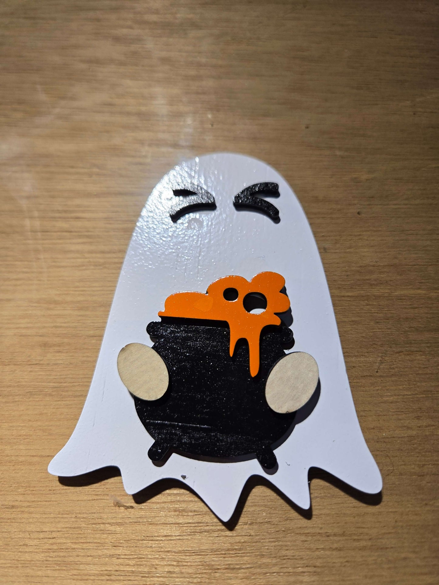 Small ghost magnet with a cauldron, perfect for holiday decor and gnome-themed decorations.