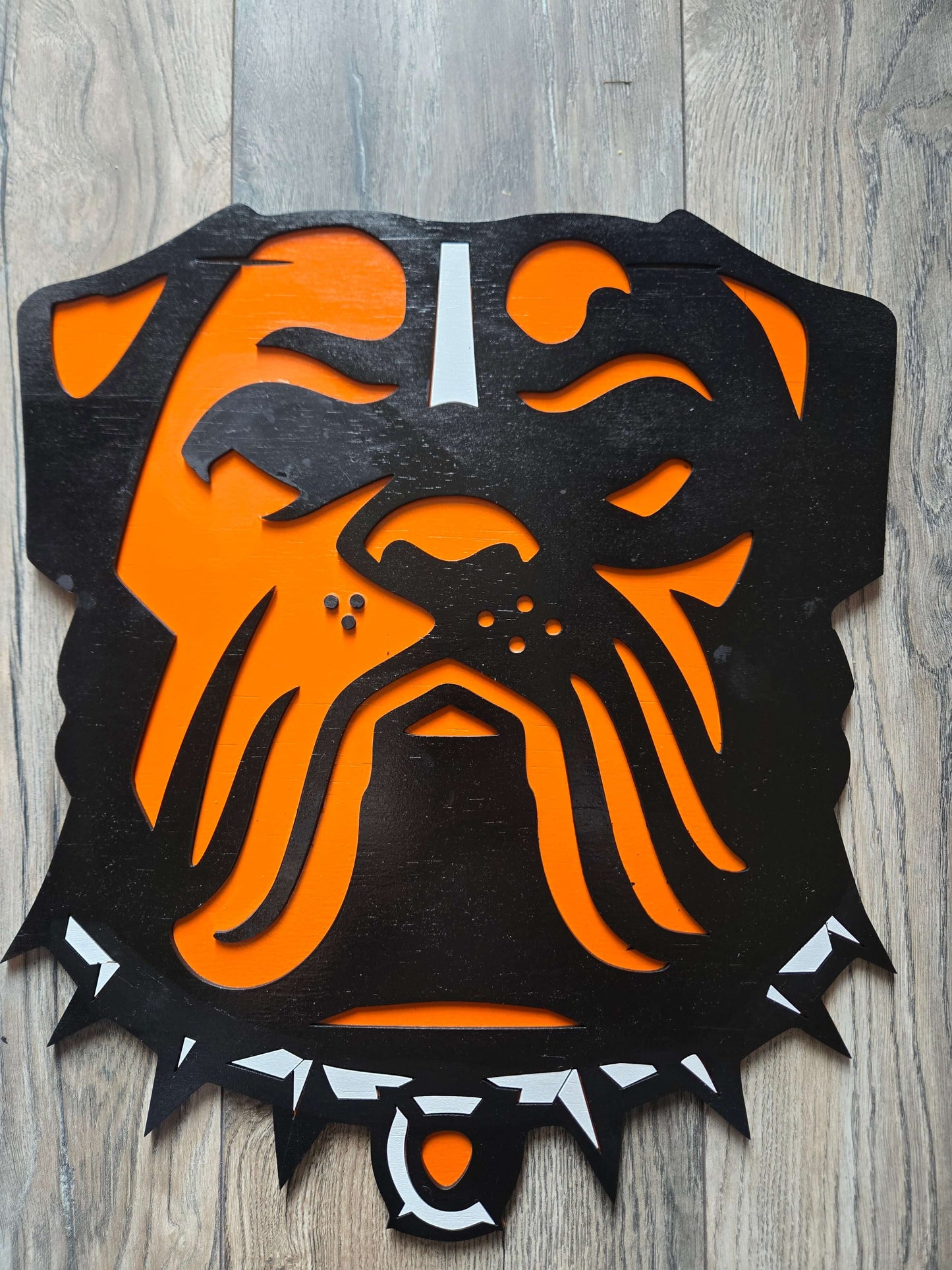 Cleveland Browns dog decor sign in orange and black featuring a bulldog design, perfect for fans.